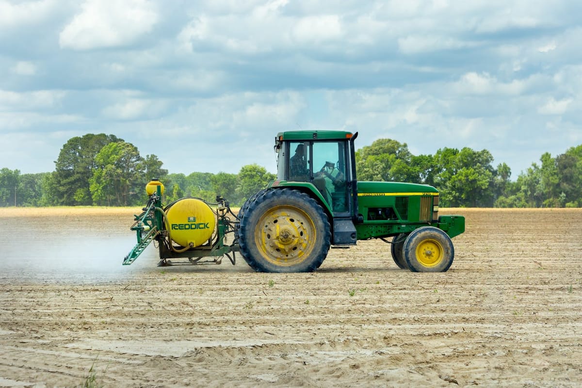 Tractor Spraying Field